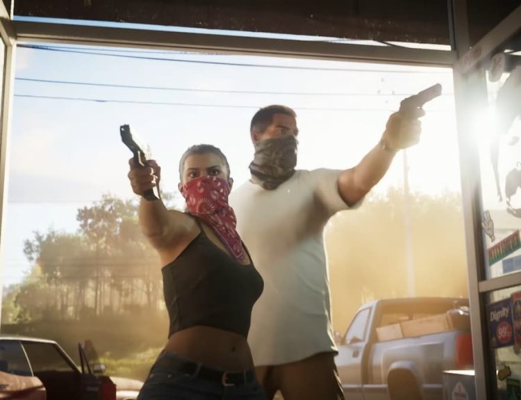 GTA 6's main characters, wearing banadanas over their nose and mouth, in the doorway of a store holding pistols.