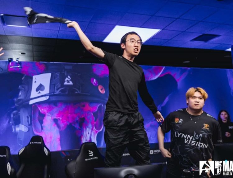 EmiliaQAQ stands and waves his jersey after Lynn Vision Gaming secures a victory at BLAST Austin Major 2025.