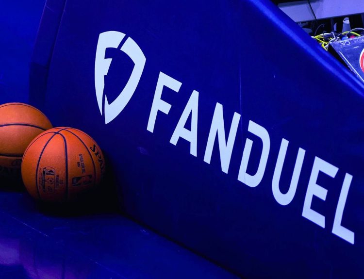 FanDuel logo and brand name displayed on a basketball court.