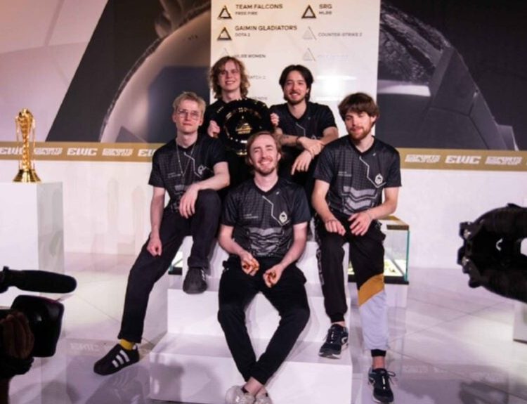 image featuring the Gaimin Gladiators Dota 2 roster that won the tournament at EWC 2024.