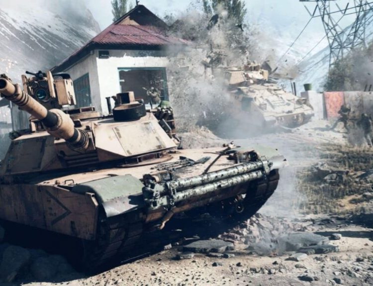 A tank in Battlefield 6, with soldiers shooting their guns in the background.