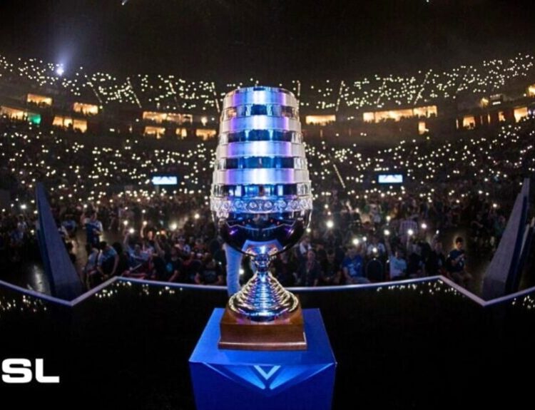 IEM Cologne trophy with the crowd holding up their phones in the background.