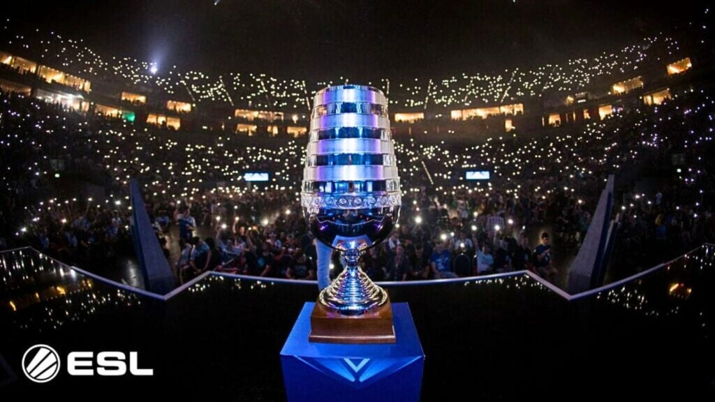 IEM Cologne trophy with the crowd holding up their phones in the background.