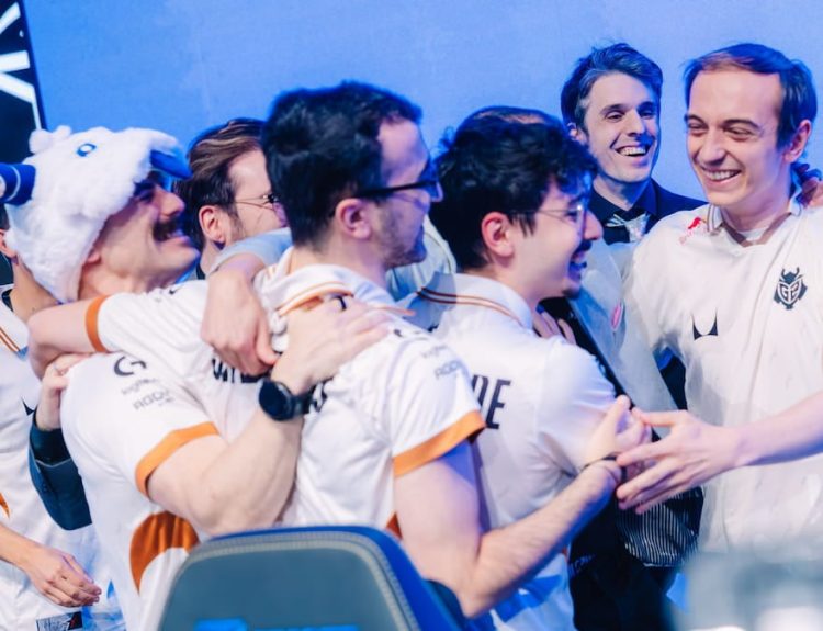 G2 Esports react onstage after their victory at League of Legends Worlds 2025 Swiss Stage on October 22, 2025 in Beijing, China.