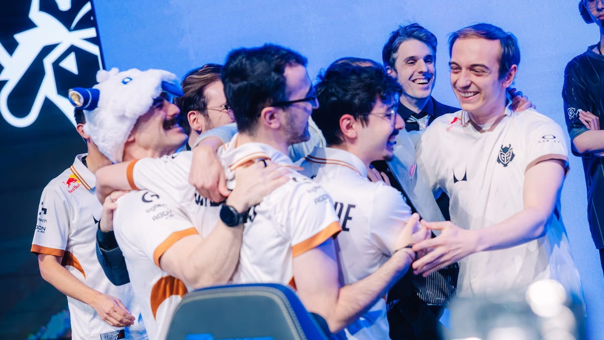 G2 Esports react onstage after their victory at League of Legends Worlds 2025 Swiss Stage on October 22, 2025 in Beijing, China.