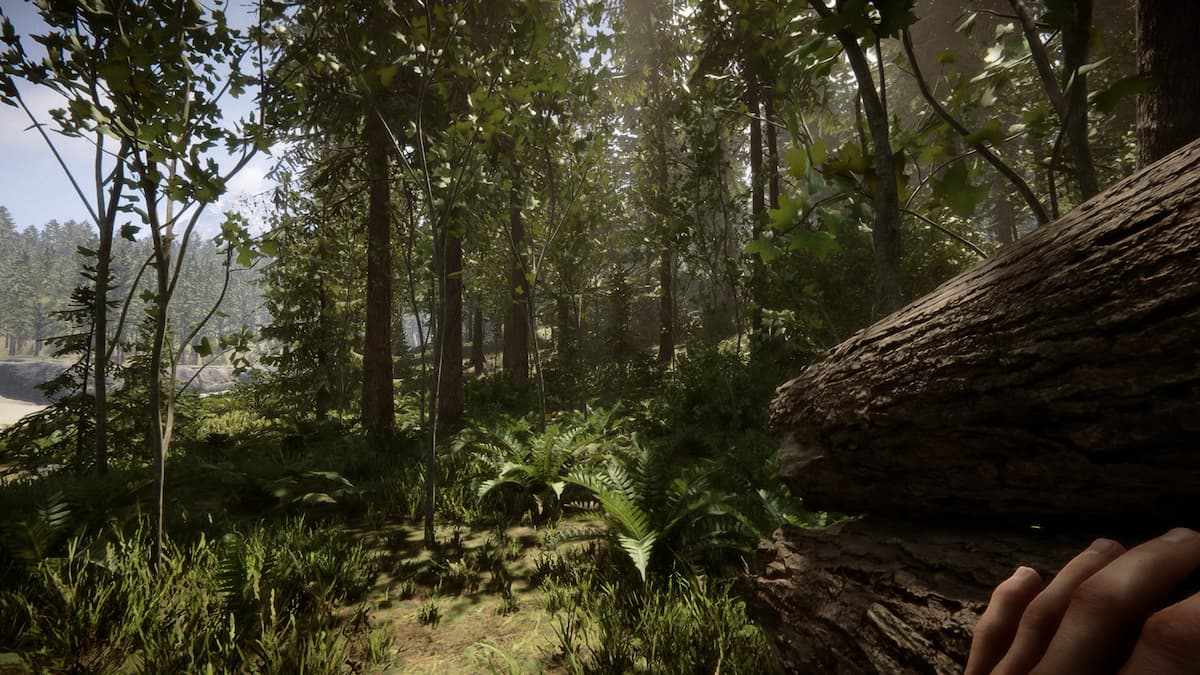 Player carrying two logs in Sons of the Forest