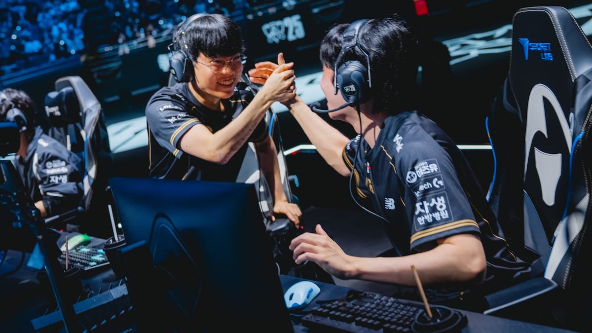 Cuzz (L) and Bdd of KT Rolster react onstage after their victory and advancing to the grand finals at League of Legends Worlds 2025 Semifinal Stage on November 01, 2025 in Shanghai, China.