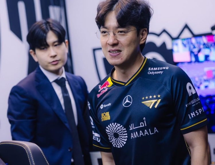 Coach Tom (L) and coach kkOma of T1 compete at League of Legends Worlds 2025 Play-In Stage on October 14, 2025 in Beijing, China.