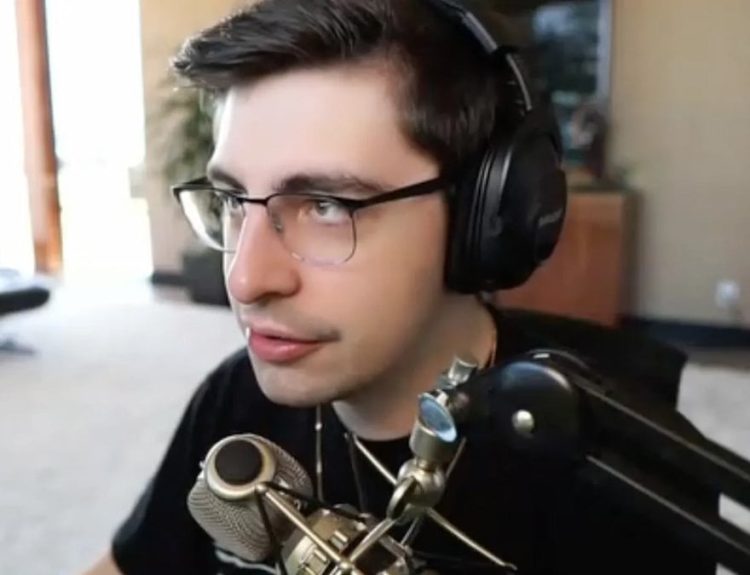 Shroud sitting at his desk