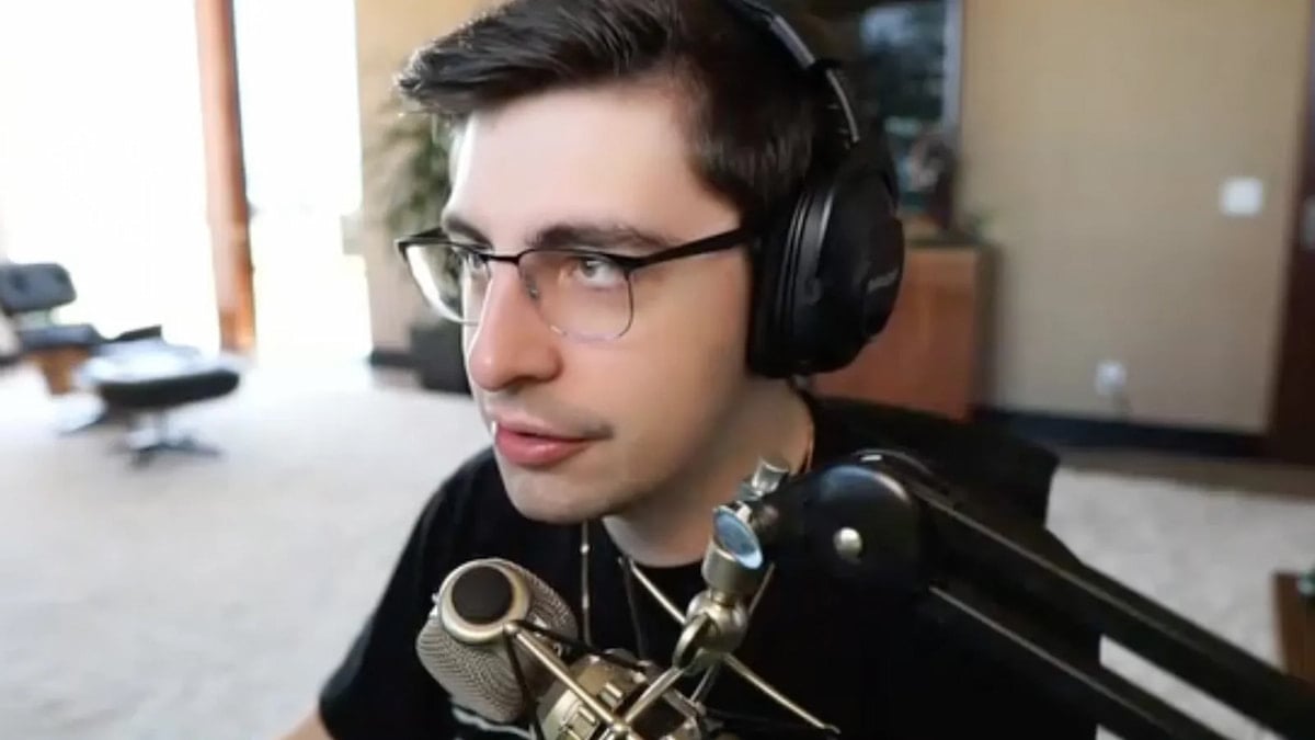 Shroud sitting at his desk