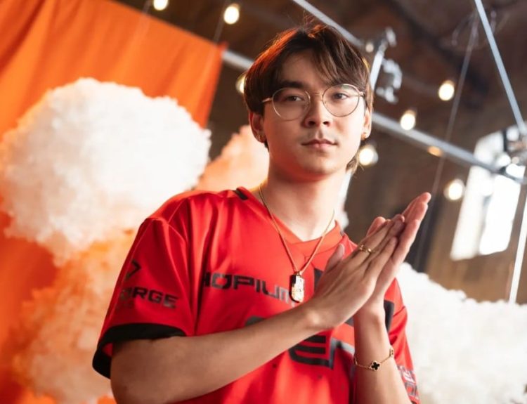 TenZ looking at the camera with hands together